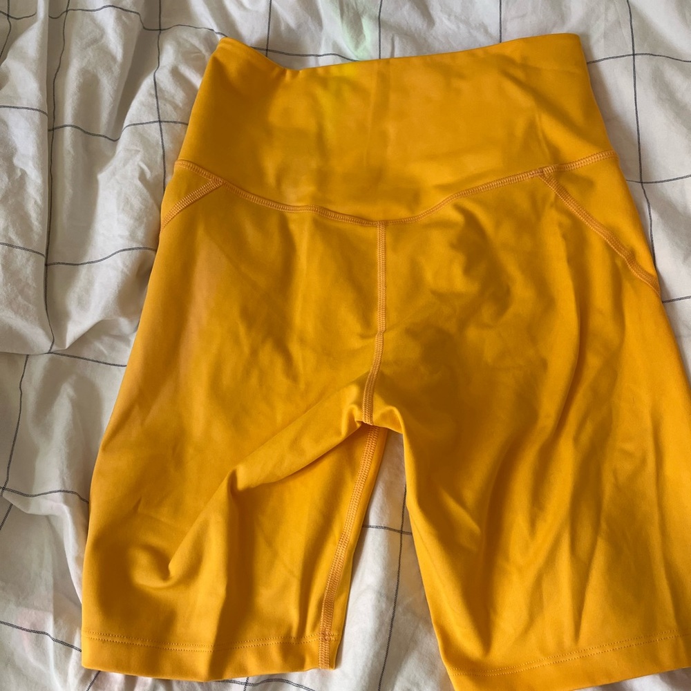 Girlfriend Collective bikes Shorts in Marigold Size Small.